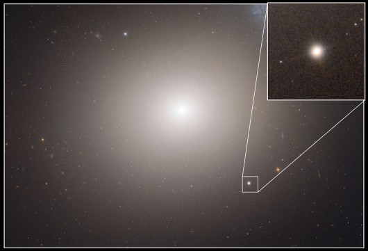 Hubble image of Messier 60 and M60-UCD1